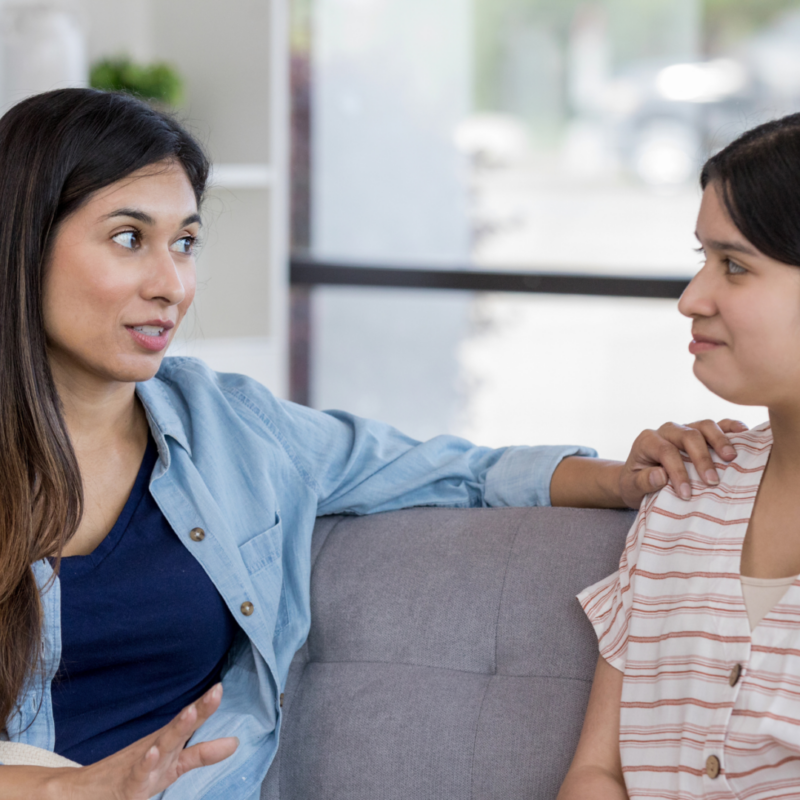 mom talking to her daughter