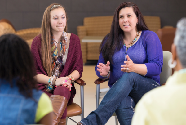 Parents in a support group talking