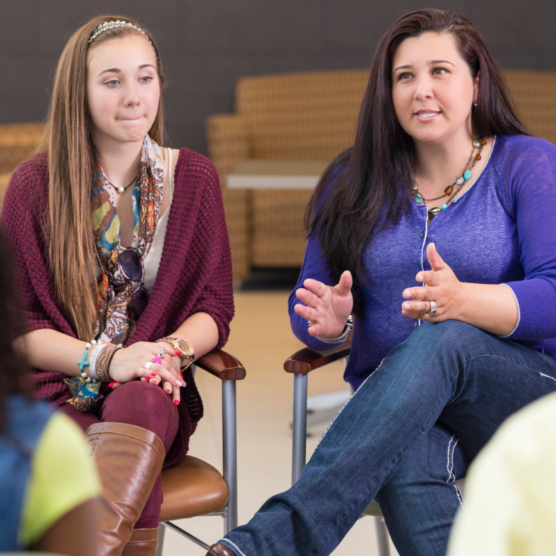 Parents in a support group talking